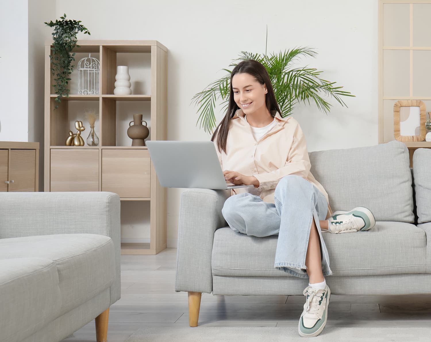 Woman booking a session on laptop